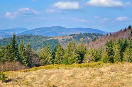 Beautiful mountain rural landscape. Charming hills and valleys on a spring day.の写真素材