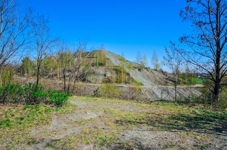 Coal industry in Poland. Mine heap in the spring scenery.の写真素材