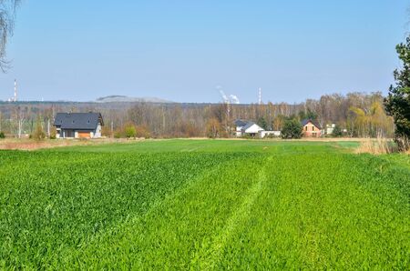 Spring rural landscape. Construction of a new home in the countryside.の写真素材