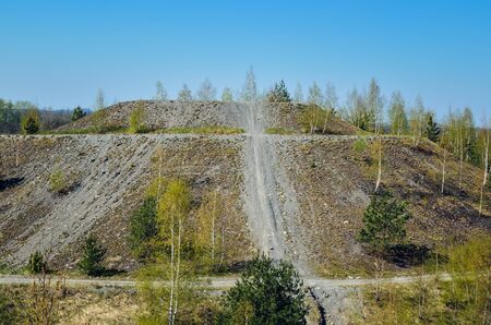 Coal industry in Poland. Mine heap in the spring scenery.の写真素材