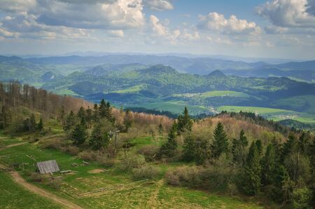 Beautiful mountain spring landscape. Picturesque valley and green hills.の写真素材