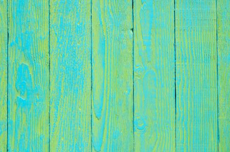 Wooden background texture. Creatively painted green and blue boards.の写真素材