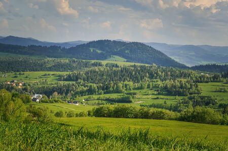 Beautiful spring green landscape. View of the charming villages in the mountains.の写真素材