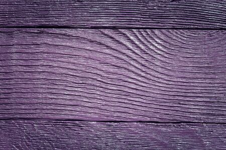 Wooden background texture. Creatively painted dark purple boards.の写真素材