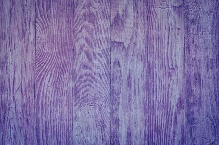 Wooden background texture. Creatively painted intense violet boards.の写真素材