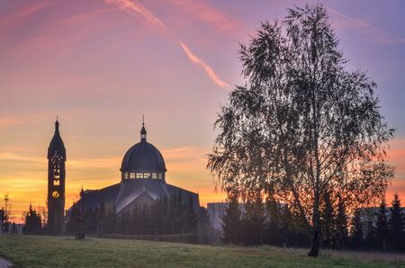 Beautiful morning autumnal place scenery. Church of the Blessed Carolina in Tychy, Poland.の写真素材