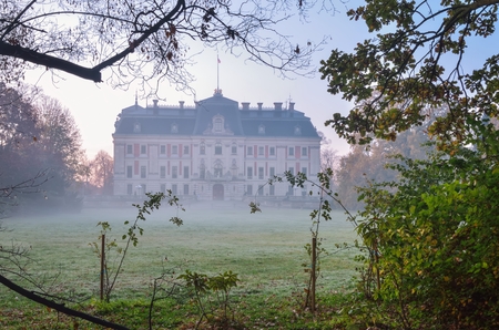 Beautiful morning fairytale landscape. Historic castle in the park in Pszczyna, Poland.のeditorial素材