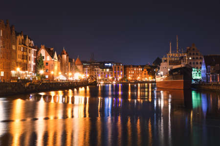 GDANSK, POLAND - OCTOBER 8, 2020: Beautiful old town by night in the seaside city of Gdansk, Poland.のeditorial素材