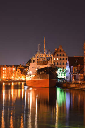GDANSK, POLAND - OCTOBER 8, 2020: Beautiful old town by night in the seaside city of Gdansk, Poland.のeditorial素材