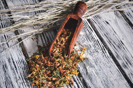 Herbs and a healthy lifestyle. Milfoil on a wooden table.の写真素材