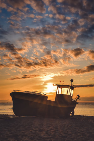 Beautiful morning view at the Polish seaside in Gdynia. Ship on a sandy beach in the morning.の写真素材