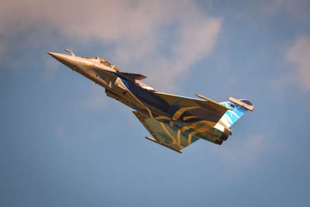 Gdynia, Poland - August 21, 2021: Flight of the French Air Force Dassault Rafale fighter plane at the Aero Baltic show in Gdynia, Poland.のeditorial素材