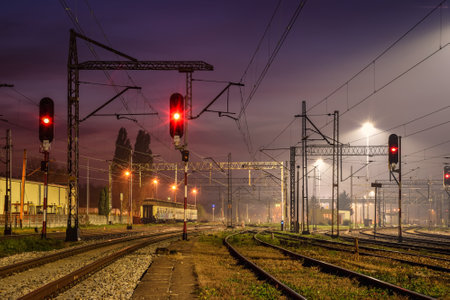 Kielce, Poland - October 23, 2019: Railway station in the evening scenery. Railroad tracks at Kielce Herby station, Poland.のeditorial素材