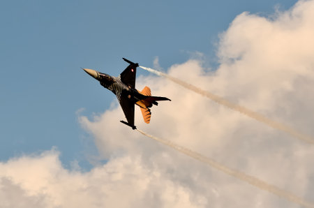 Gdynia, Poland - August 21, 2021: Flight of the F 16 plane at the Aero Baltic Show in Gdynia, Poland.のeditorial素材