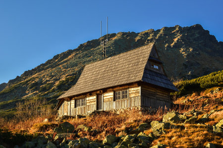 Beautiful summer mountain landscape. A lovely wooden cabin in the Polish Tatra Mountains.の写真素材