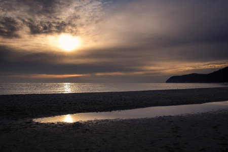 Morning sea landscape. Sunrise on the beach by the Polish Baltic sea.の写真素材