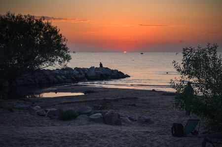 Beautiful morning seaside landscape. Tent on the beach in Gdynia, Poland.の写真素材