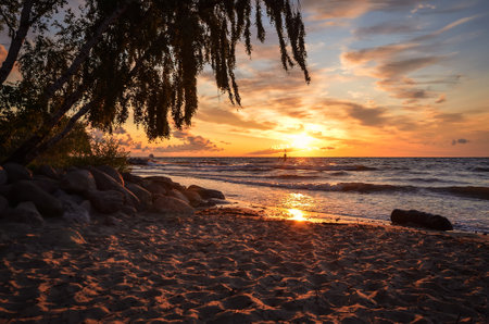 Beautiful summer seaside landscape. Sunrise over the sea in Gdynia, Poland.の写真素材