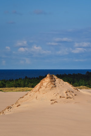 Beautiful holiday seaside landscape. Moving dunes in the desert in Slowinski National Park in Leba, Poland.の写真素材
