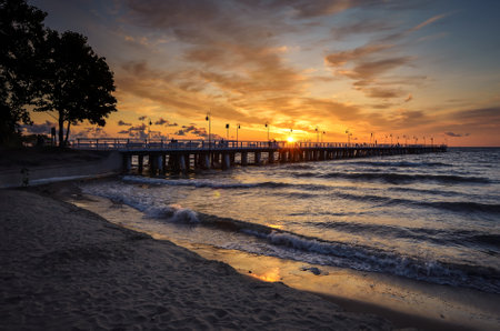 Beautiful morning seaside landscape. Popular pier in Gdynia, Poland at sunrise.の写真素材