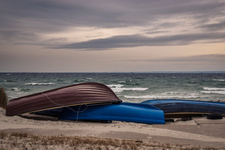 Winter cloudy seaside landscape. Boats on the shores of the Baltic Sea. Photo taken in Gdynia, Poland.の写真素材