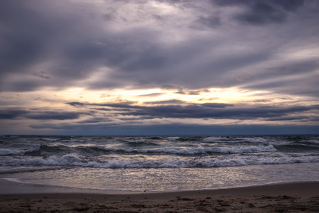 Cloudy winter seaside landscape. Cloudy day on the beach in Gdynia, Poland.の写真素材