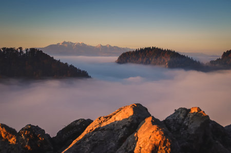 Fabulous colorful autumn landscape. Magical morning in the Polish mountains. Photo taken on top of Sokolica in Pieniny, Poland.の写真素材