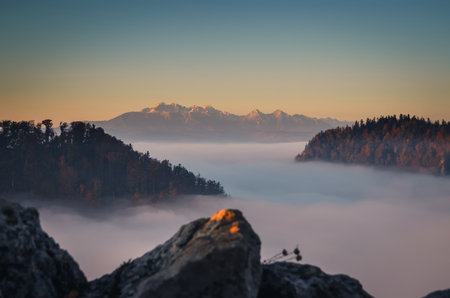 Fabulous colorful autumn landscape. Magical morning in the Polish mountains. Photo taken on top of Sokolica in Pieniny, Poland.の写真素材