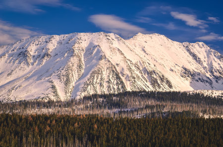 Beautiful early spring mountain landscape. View of the snow-white peaks in the Polish Tatra Mountains.の写真素材