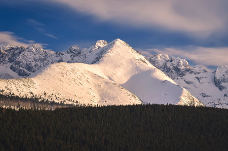 Beautiful early spring mountain landscape. View of the snow-white peaks in the Polish Tatra Mountains.の写真素材