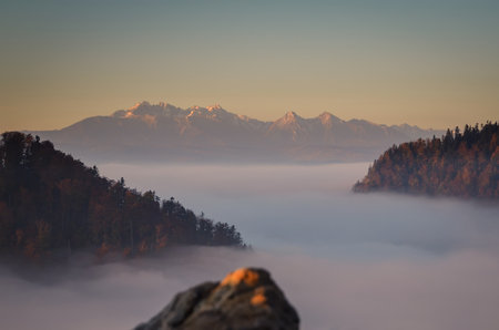 Fabulous colorful autumn landscape. Magical morning in the Polish mountains. Photo taken on top of Sokolica in Pieniny, Poland.の写真素材