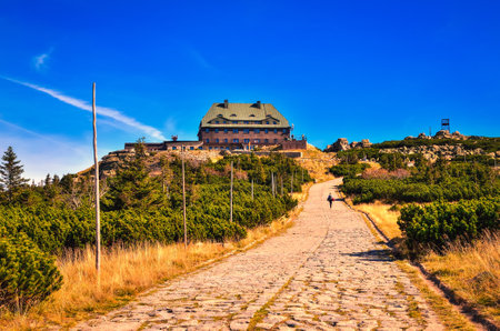 Mountain chalet at the top of Szrenica peak among dwarf mountain pines in the Karkonosze National...