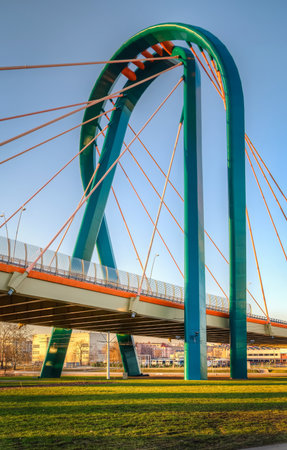 Modern bridge over a river. Cable stayed bridge over Brda river in Bydgoszcz City, Poland.の写真素材