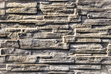 interesting concept of a stone texture. Modern gray wall to use as a background.の写真素材
