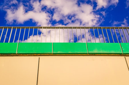 Architectural detail in the city. Railing of footbridge crossing the road.の写真素材