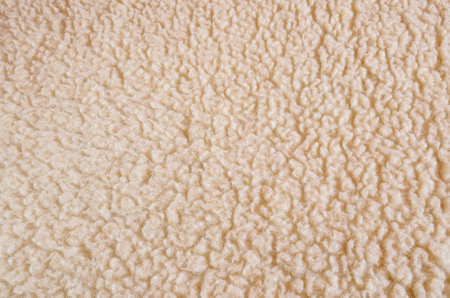 Furry blanket texture. Close-up of bright merino woolen blanket, may be used as background.の写真素材