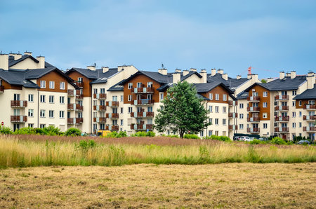 Tychy, Poland - July 14, 2015: New housing estates in Tychy City, Poland. Public view of newly built block of flats in the green area.のeditorial素材