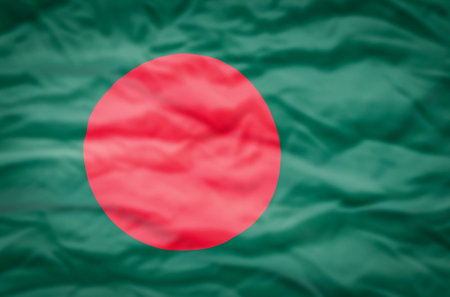 Bangladesh flag on a wavy background. Wavy flag of Bangladesh fills the frame.の写真素材