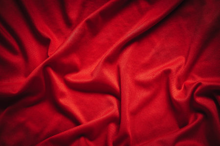 Wrinkled fabric texture. Close-up of soft cotton cloth, may be used as background.の写真素材