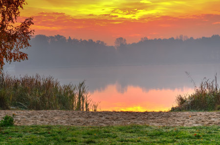 Colorful morning landscape. Sunrise over the Paprocany lake in Tychy, Poland.の写真素材