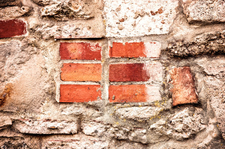 Wall background or texture. Old stone and brick texture.の写真素材
