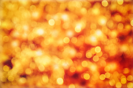 Orange abstract background. Blurred and glowing lights.の写真素材