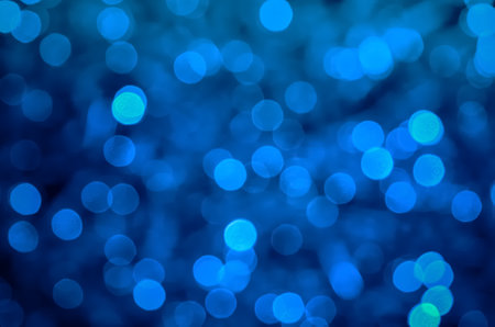 Blue abstract background. Blurred and glowing blue lights.の写真素材