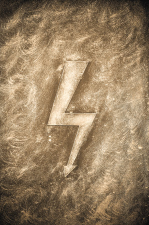 High voltage sign in vintage style. Danger electrical hazard high voltage sign on the stone wall.の写真素材