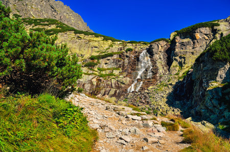 Waterfall in mountain scenery. Summer mountain landscape in High Tatra, Slovakia.の写真素材