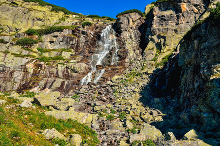 Summer mountain landscape in Slovak mountains. Beautiful waterfall in High Tatra, Slovakia.の写真素材