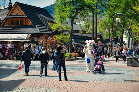 Zakopane, Poland - May 8, 2016: Tourists on a popular Krupowki street in Zakopane, Poland.のeditorial素材