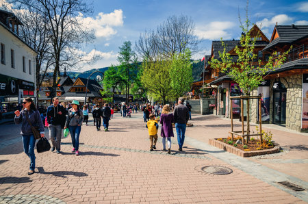 Zakopane, Poland - May 8, 2016: Tourists on a popular Krupowki street in Zakopane, Poland.のeditorial素材