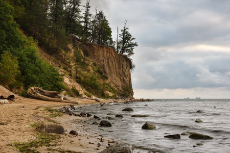Beautiful landscape on the Polish Baltic Sea. Beach with stones and a beautiful cliff in Gdynia...