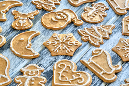 Christmas background with gingerbread. Sweet gingerbreads on a wooden table.の写真素材